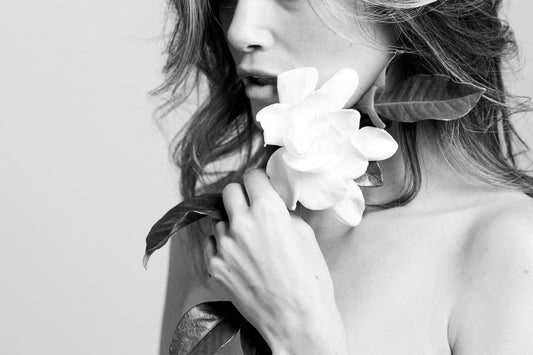 beautiful woman with gardenia flower